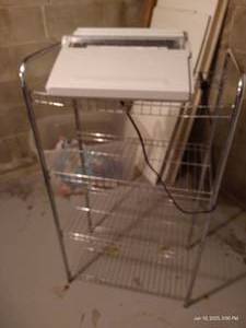 lot 138 image: Wire Rack & Typewriter