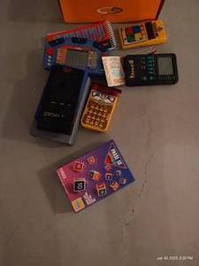 lot 155 image: Dominoes & Electric Hand Games