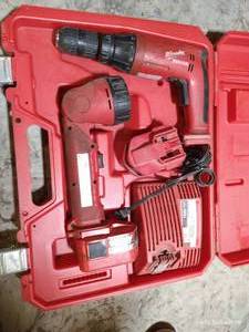lot 334 image: Milwaukee Power Drill, Flashlight, Charger & Battery