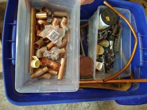 lot 396 image: Tote of Plumbing & Electrical Supplies