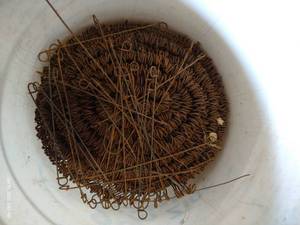 lot 557 image: Bucket of Metal Ties