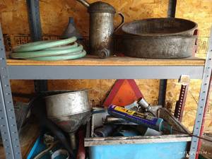 lot 600 image: Two Shelves Oil-Changing Equipment