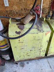 lot 608 image: Left Side Gas Tank w Pistol Hand Pump