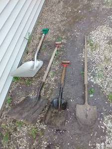 lot 617 image: Four Shovels