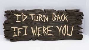 lot 532 image: Wizard of Oz Id Turn Back If I Were You Resin Sign