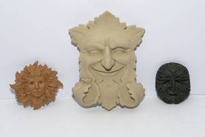 lot 552 image: Set of Three GreenmanGreen Woman Wall Plaques  Cement & Resin
