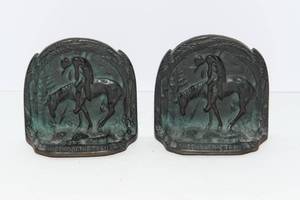 lot 576 image: Antique Cast Iron End of the Trail Bookends  Set of Two
