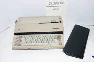 lot 643 image: Olympia XL 121 Electric Typewriter with Manual
