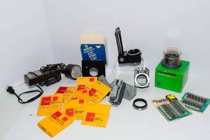 lot 664 image: Vintage Photography Equipment Lot  Lenses, Accessories, Lighting & More