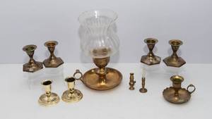 lot 739 image: Collection of  Brass and Brass-Toned Candlesticks