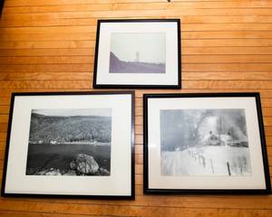 lot 753 image: Three Framed and Matted Black and White Photographic Prints - One signed by Sawyer