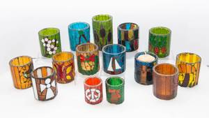 lot 830 image: A Large Assortment Mosaic Stained Glass Style Candle Holders