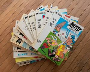 lot 823 image: A Collection of 16 Asterix Gallus Comic Books (mostly hardcover)