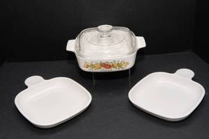 lot 874 image: Vintage Corning Ware Spice of Life Casserole Dish with Pyrex Lid and a set of Vintage Corning Ware Grab It Snack Plates