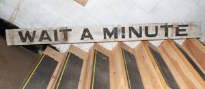 lot 889 image: WAIT A MINUTE Wooden Sign (90 x 7.5)