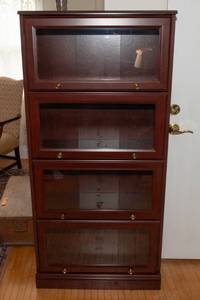 lot 657 image: Sauder Cherry-Tone Laminate Barrister-Style Bookcase with Glass Doors  60T x 28.5L x 12D (#9)