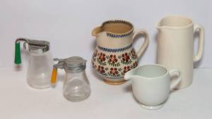 lot 491 image: Three Ceramic Pitchers and Two Syrup Dispensers