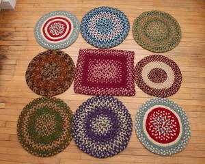 lot 515 image: 9 Braided Seat Cushions