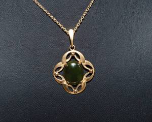 lot 497 image: Gold Tone Necklace with Green Stone Pendant  Possibly Jade