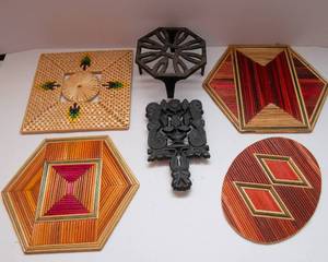 lot 480 image: Set of 6 Trivets  Straw and Cast Iron