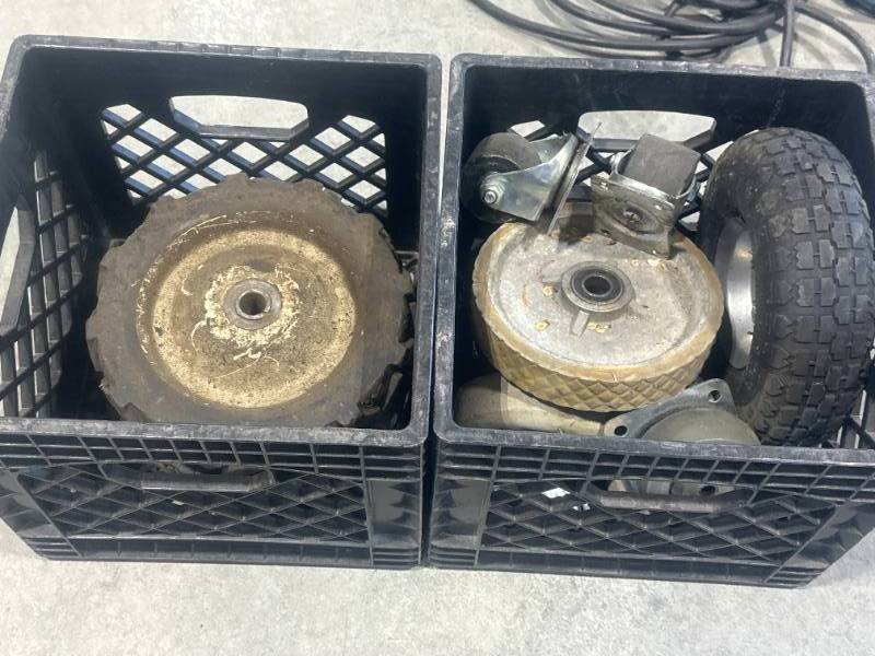lot 37 image: 2 Milk Crates Full of Wheels  Casters