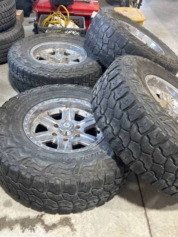 lot 67 image: Set of 4 Trac Grip MT265x75-16 Tires