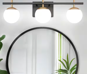 lot 47 image: Monteaux Lighting 25.5 in. 3-Light Gold Bathroom Vanity Light Fixture with Opal Glass Shades