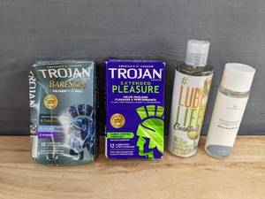 lot 62 image: Brand New Trojan Condoms and Lubricants - 4 Items