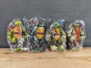 lot 31J image: 4 Brand New Teenage Mutant Ninja Turtles Action Figures - Donatello, Leonardo, Michelangelo, Raphael