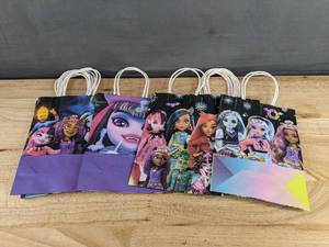 lot 132 image: 12 Brand New Monster-Themed Party Favor Gift Bags