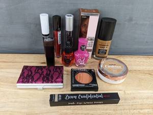 lot 1005 image: 11 New Assorted Makeup Items Lip Gloss, Nail Polish, Etc.