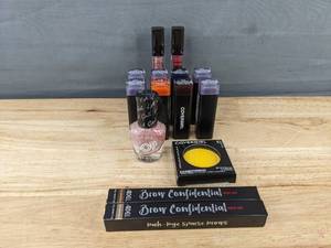 lot 400 image: New Makeup Including Lipsticks and Eye Products Covergirl, LA Colors, Ardell, and Others