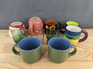 lot 844 image: 9 Brand New Unique Mugs and Glasses