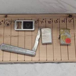lot 32 image: Old Zippos and Big Chief Knife