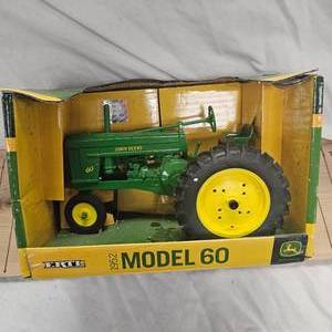 lot 38 image: John Deere 1952 Model 60, in box