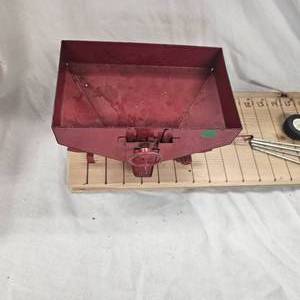 lot 6 image: Classic 116 Ertl Red Steel Gravity Wagon with n