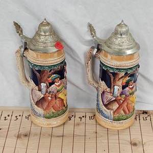 lot 57 image: German Steins-2 Very Nice Beer Steins Toast Erst Mach Dein Sach Trink und Lach