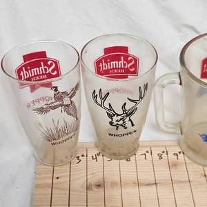 lot 75 image: Schmidt Whopper Glasses and 2 Schmidt Pitchers