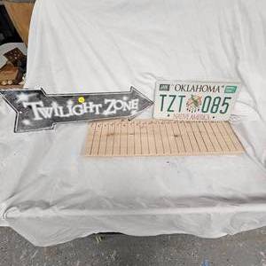 lot 79 image: Native American License Plate and Sign