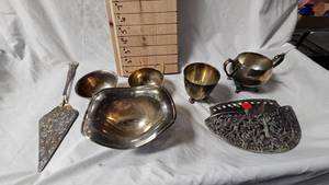 lot 49 image: Assorted Silver Plated Pieces, Creamer, Bowls, Pie Server and Wall Hanger
