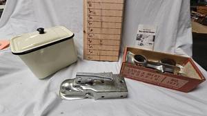 lot 56 image: Enamel Coated Storage Container, 1 78th Hitch, and FoodMeat Chopper