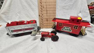 lot 66 image: Christmas Caboose and Train Car and Ford Die Cast Tractor