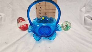 lot 67 image: 2 Glass Blown Paperweight and Blue Ruffled Handle Glass Basket(handle repaired)
