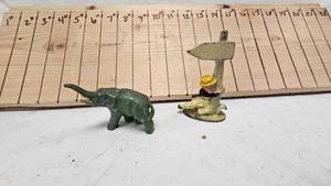 lot 78 image: Cast Metal Elephant and Cast Iron Drunk on Light Pole