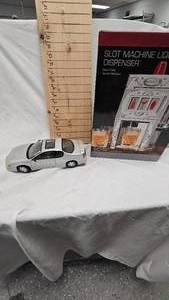 lot 99 image: 2000 Monte Carrlo Model Car and Liquor Slot Machine Dispenser