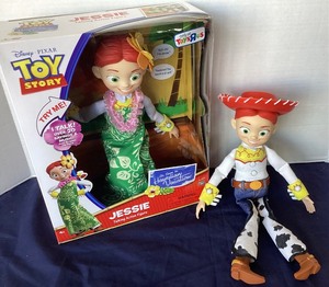 lot 203 image: Toy Story Jessie Hawaiian Vacation and Jessie Cowgirl Doll