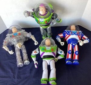lot 207 image: Group of 4 Assorted Buzz Lightyear Action Figures