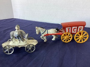 lot 215 image: Antique Tin Man on Sled and Vintage C.I. Ice Wagon