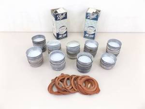 lot 28 image: Large Lot of Vintage Mason Jar Insulated Zinc Lids