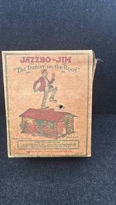 lot 7 image: Vintage Jazzbo Jim Wind-Up Tin Toy - The Dancer on the Roof